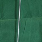 Vintage wooden-shafted golf club with a red-stained head